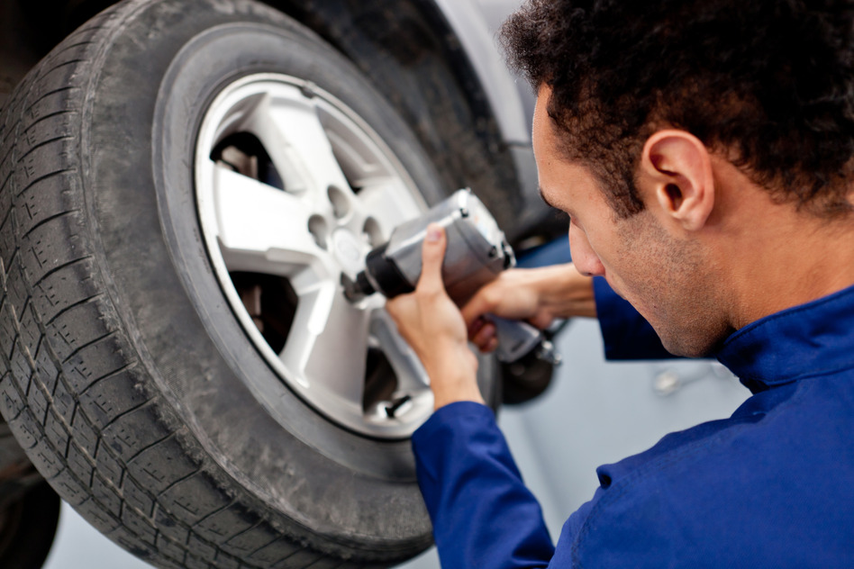 Mechanic fixing a puncture